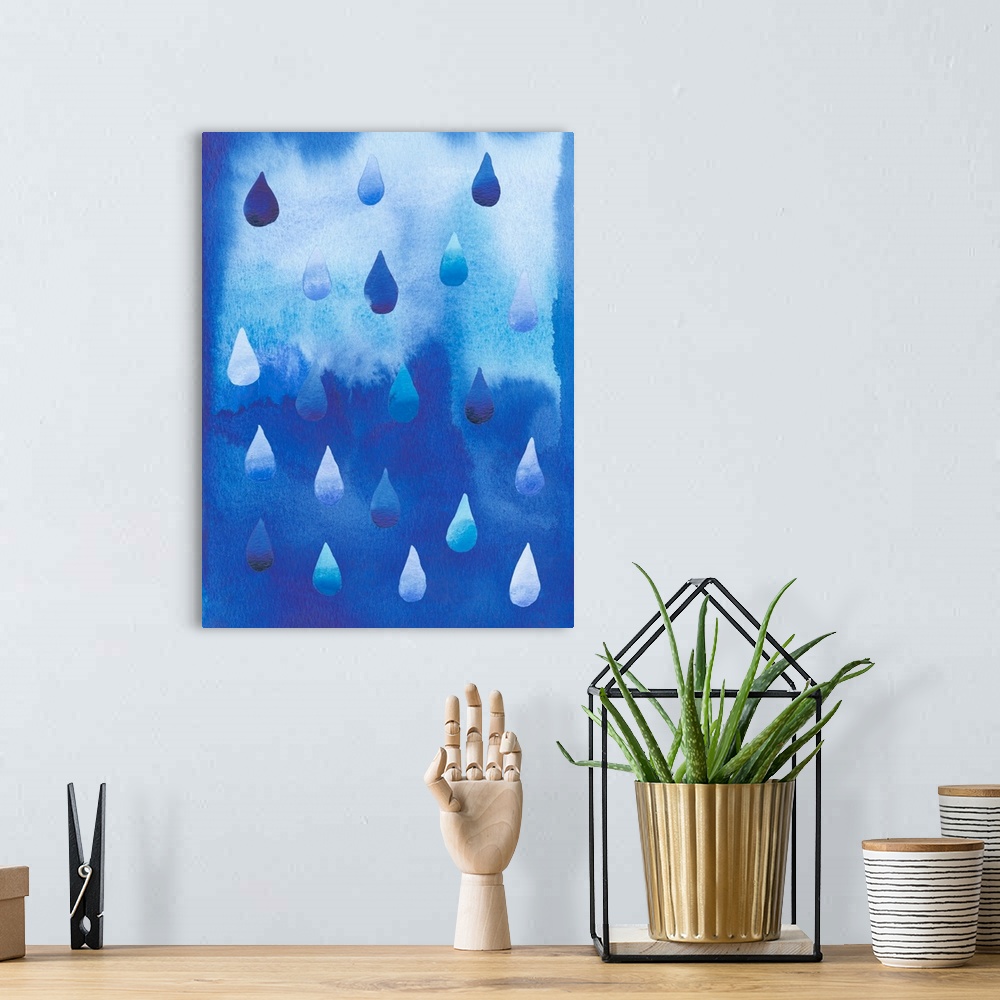 A bohemian room featuring This monochromatic decorative artwork features raindrops falling against a blue watercolor backgr...