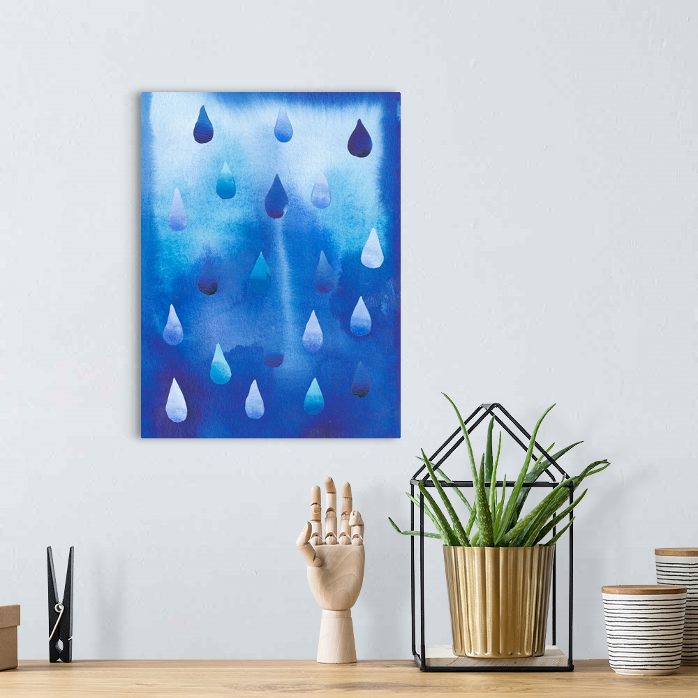 A bohemian room featuring This monochromatic decorative artwork features raindrops falling against a blue watercolor backgr...