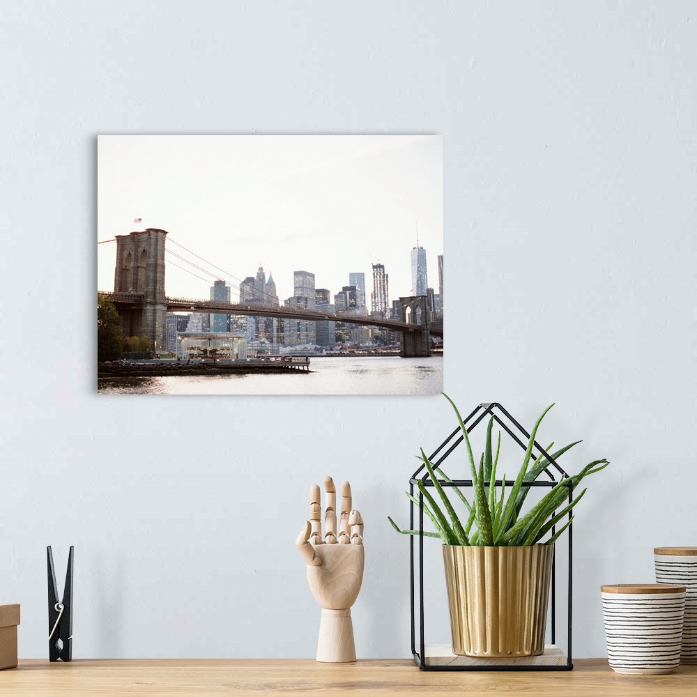 A bohemian room featuring Photograph of the buildings underneath the Manhattan Bridge, New York City.