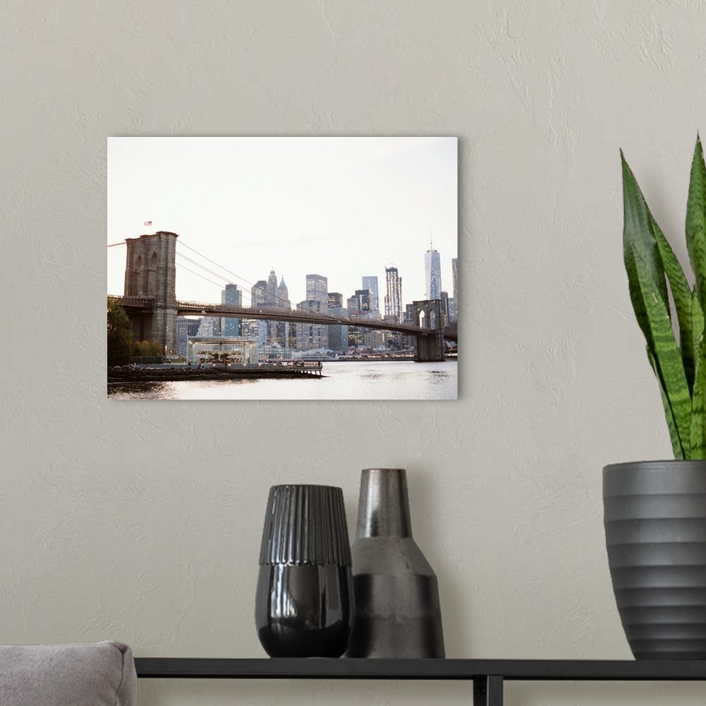 A modern room featuring Photograph of the buildings underneath the Manhattan Bridge, New York City.