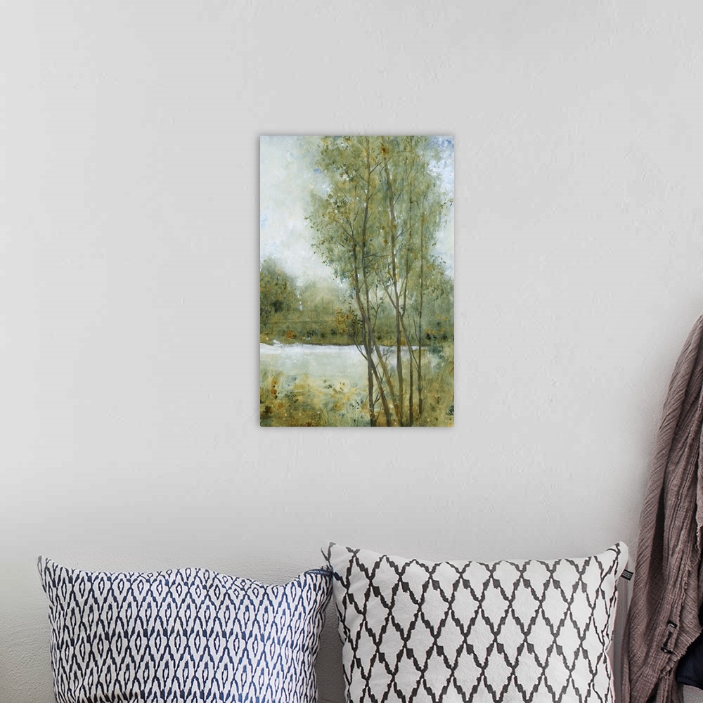 A bohemian room featuring Contemporary painting of an idyllic countryside scene with trees and a river.