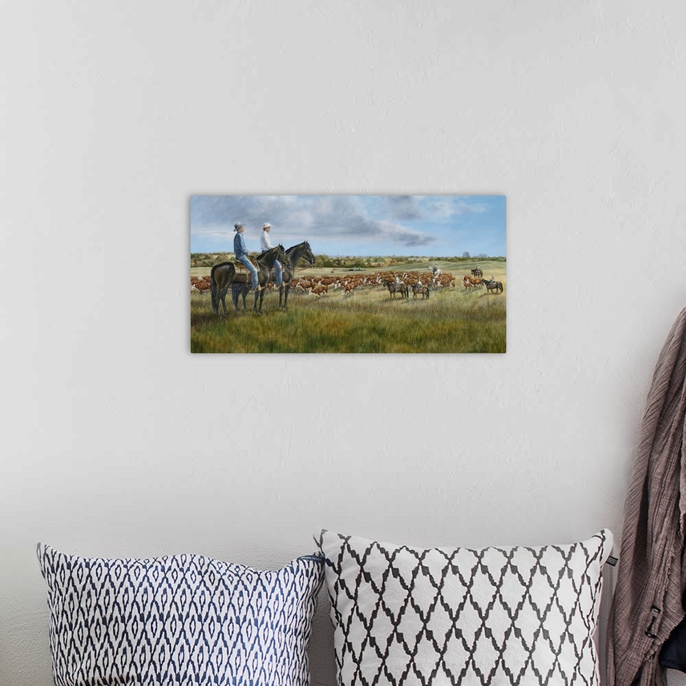 A bohemian room featuring Contemporary painting of cowboys sitting atop their horses overlooking their herd.