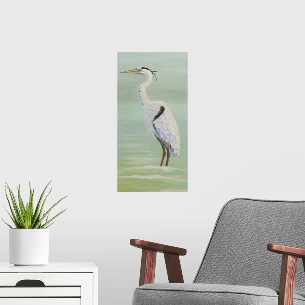 A modern room featuring Painting of a tall heron standing in shallow water.