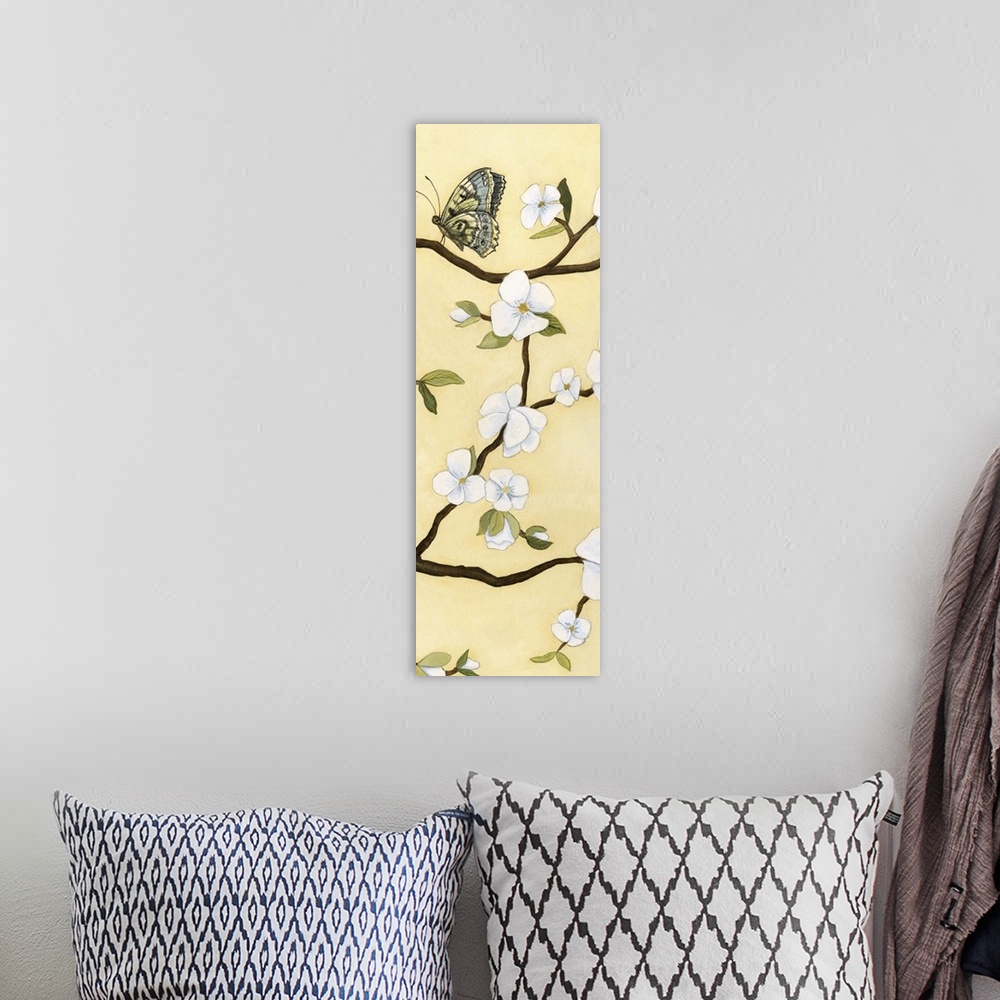 A bohemian room featuring Contemporary decor artwork of white flowers on a dark brown tree branch against a pale yellow bac...