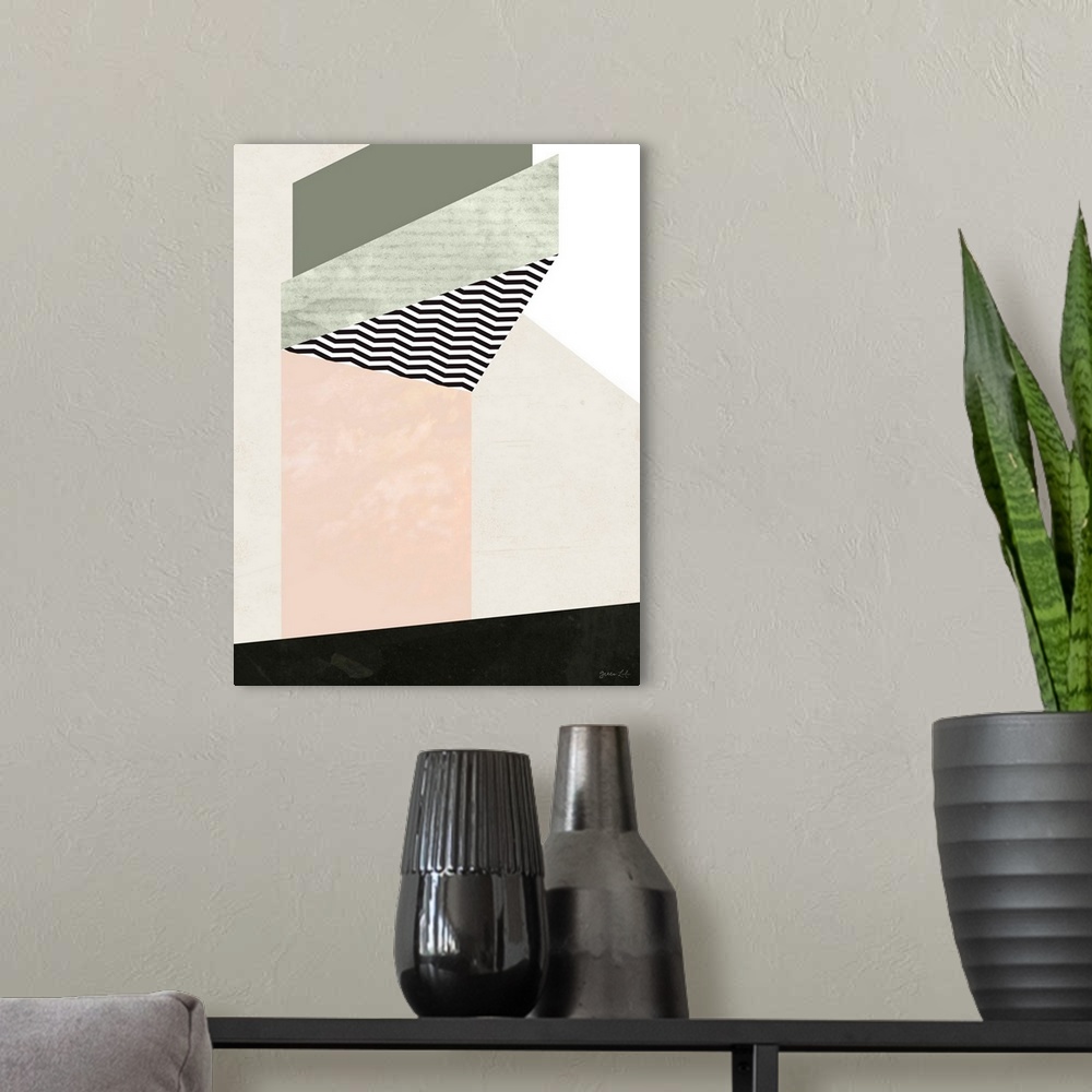 A modern room featuring Geometric abstract painting of shapes in black, beige, and pale pink.