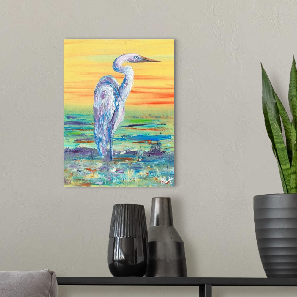 A modern room featuring Painting of a white egret standing in shallow water at sunset.