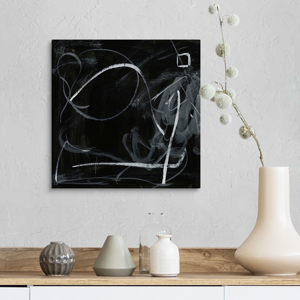 A farmhouse room featuring Black and white abstract painting.
