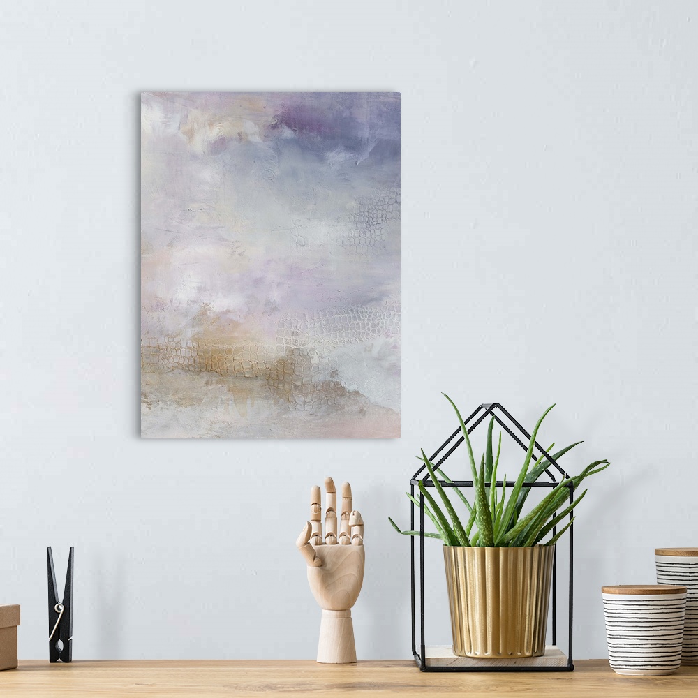 A bohemian room featuring Contemporary abstract artwork in pastel white and purple tones, resembling an evening sky.