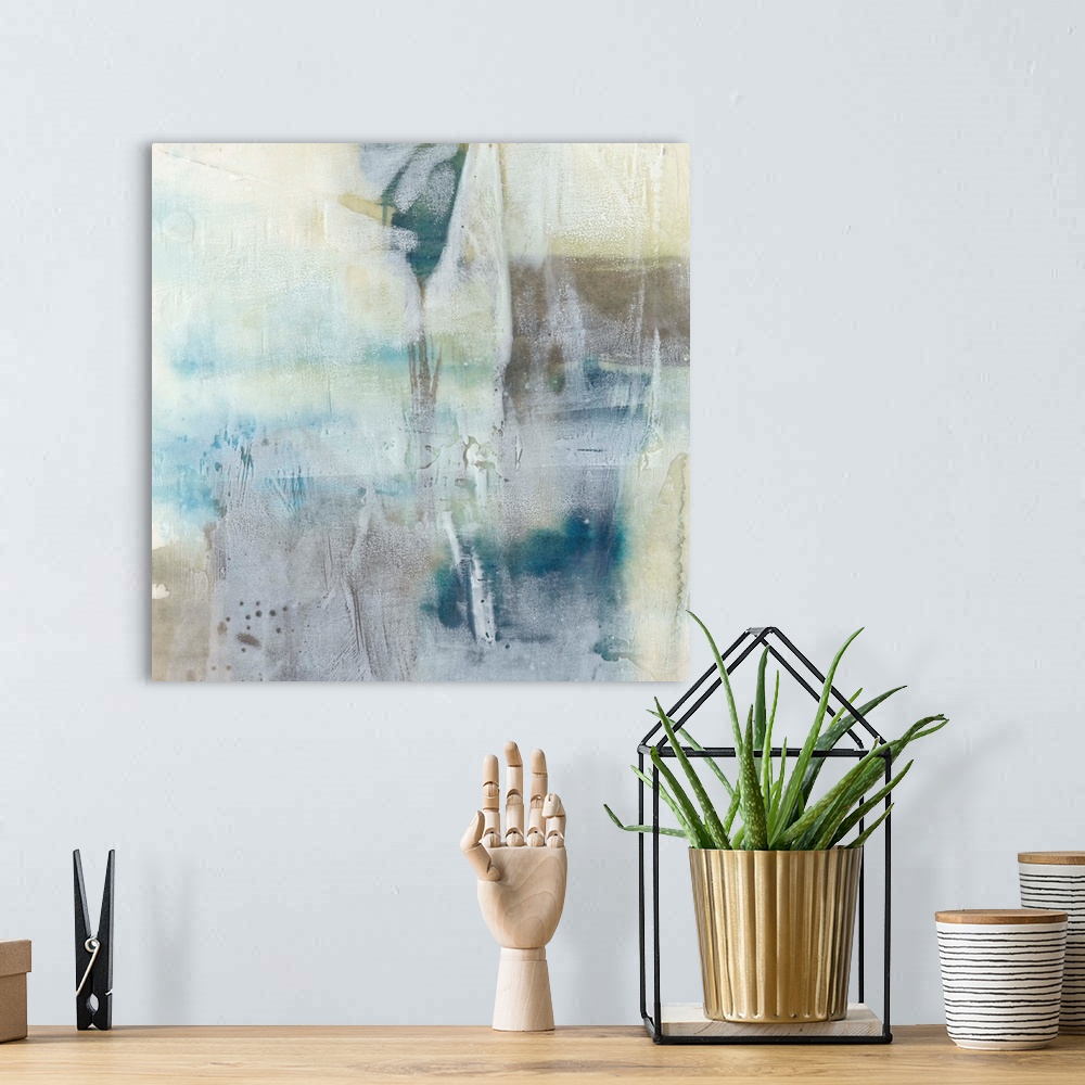 A bohemian room featuring Contemporary abstract art print in pale blue and tan shades, with a washed out effect.