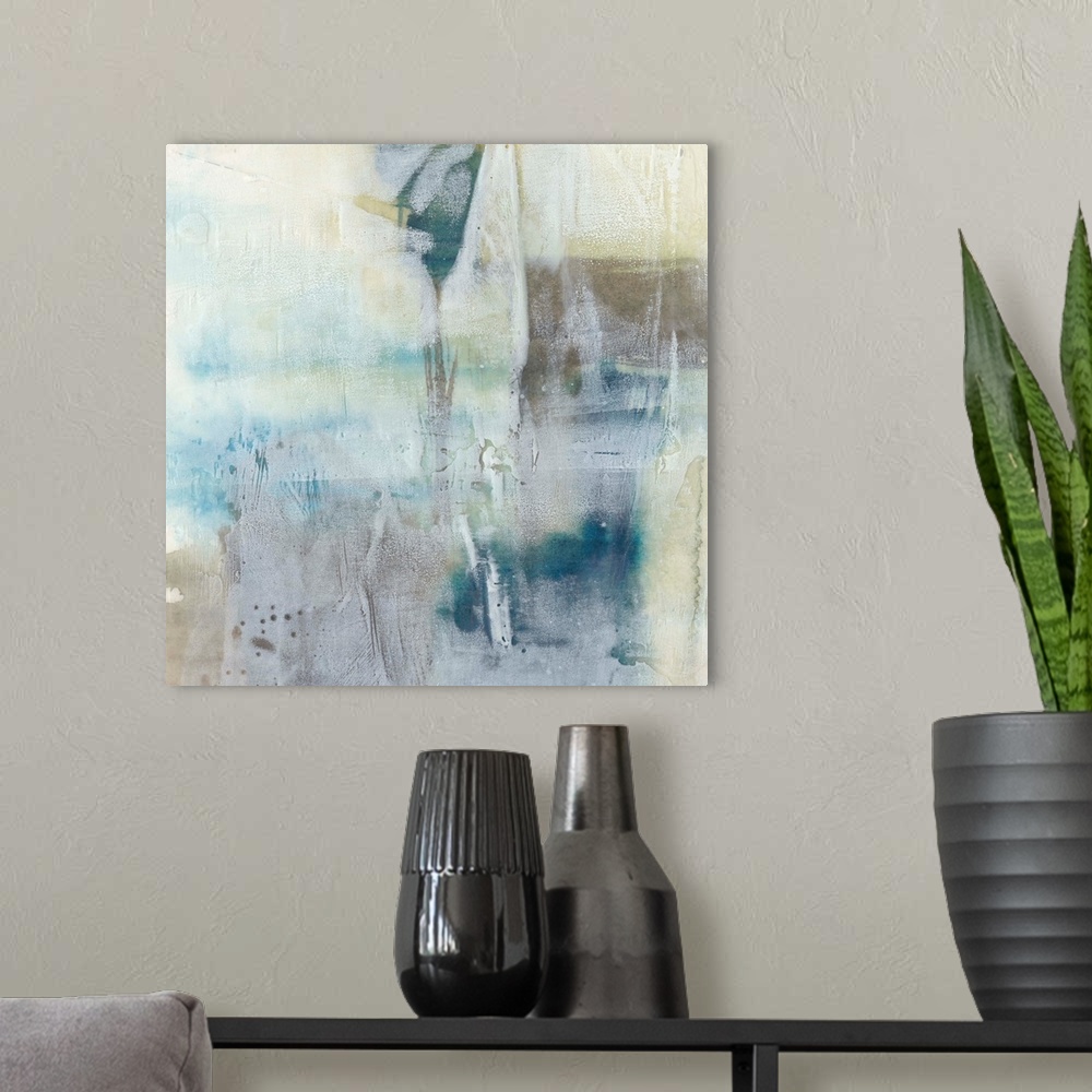 A modern room featuring Contemporary abstract art print in pale blue and tan shades, with a washed out effect.