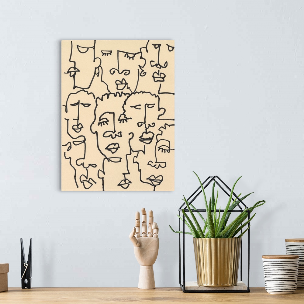 A bohemian room featuring Contemporary line art illustration of peoples' faces in black lines on a tan background