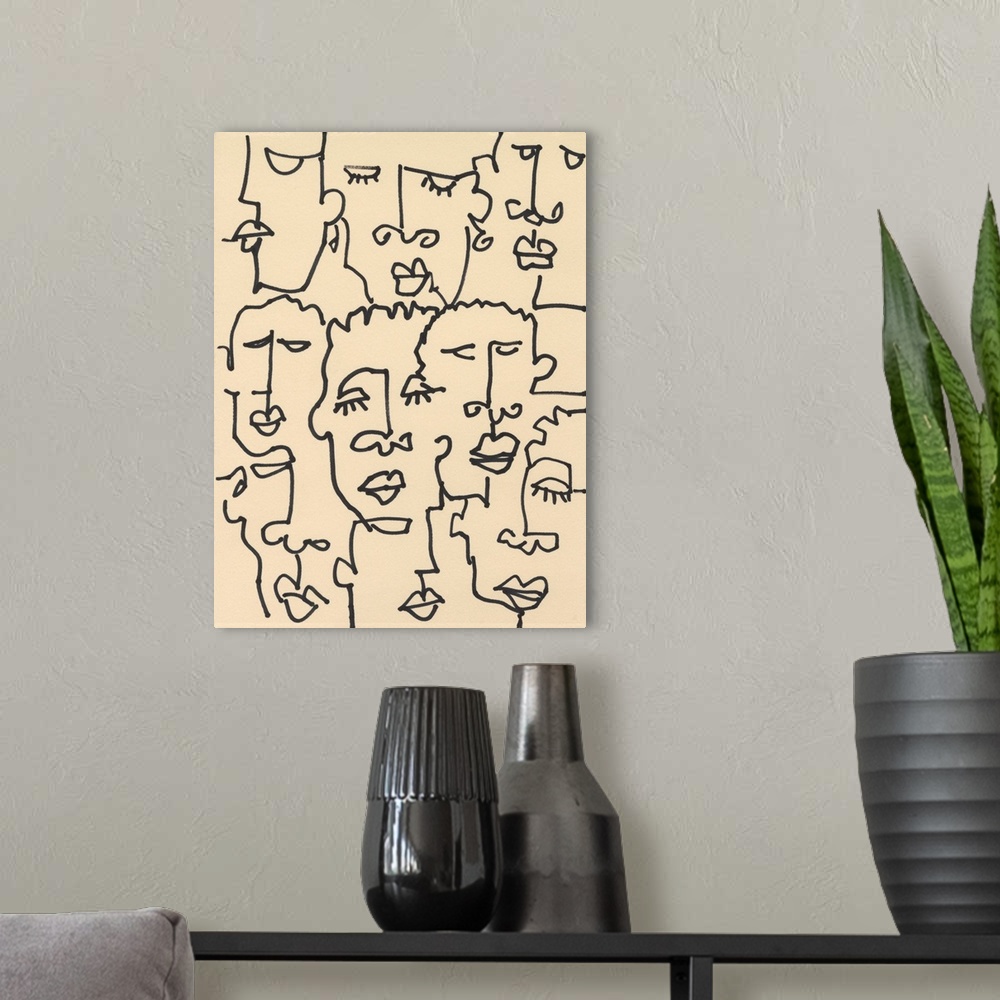 A modern room featuring Contemporary line art illustration of peoples' faces in black lines on a tan background