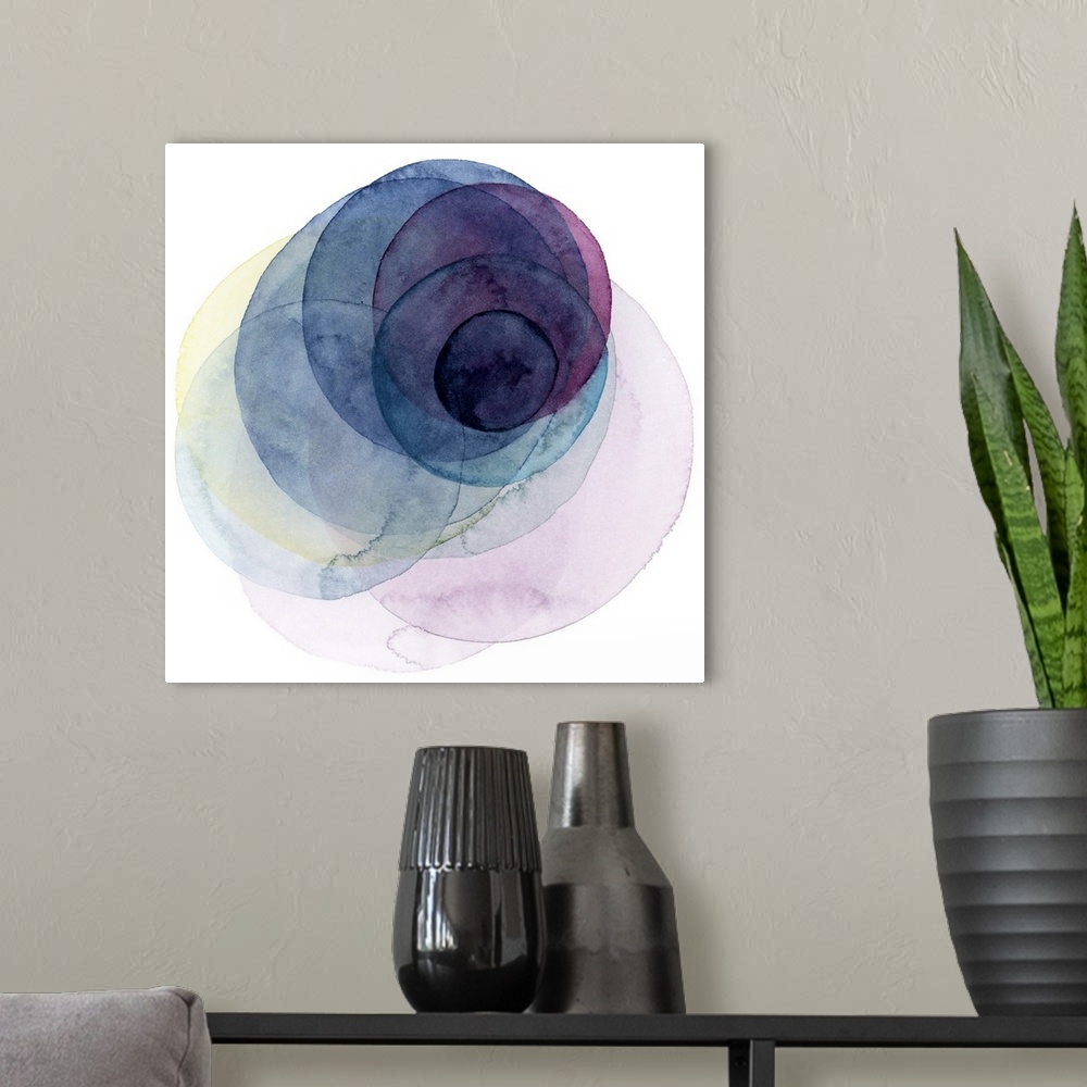 A modern room featuring Inspired by the cosmos, these spinning watercolor circles resemble the orbit a planet takes in sh...