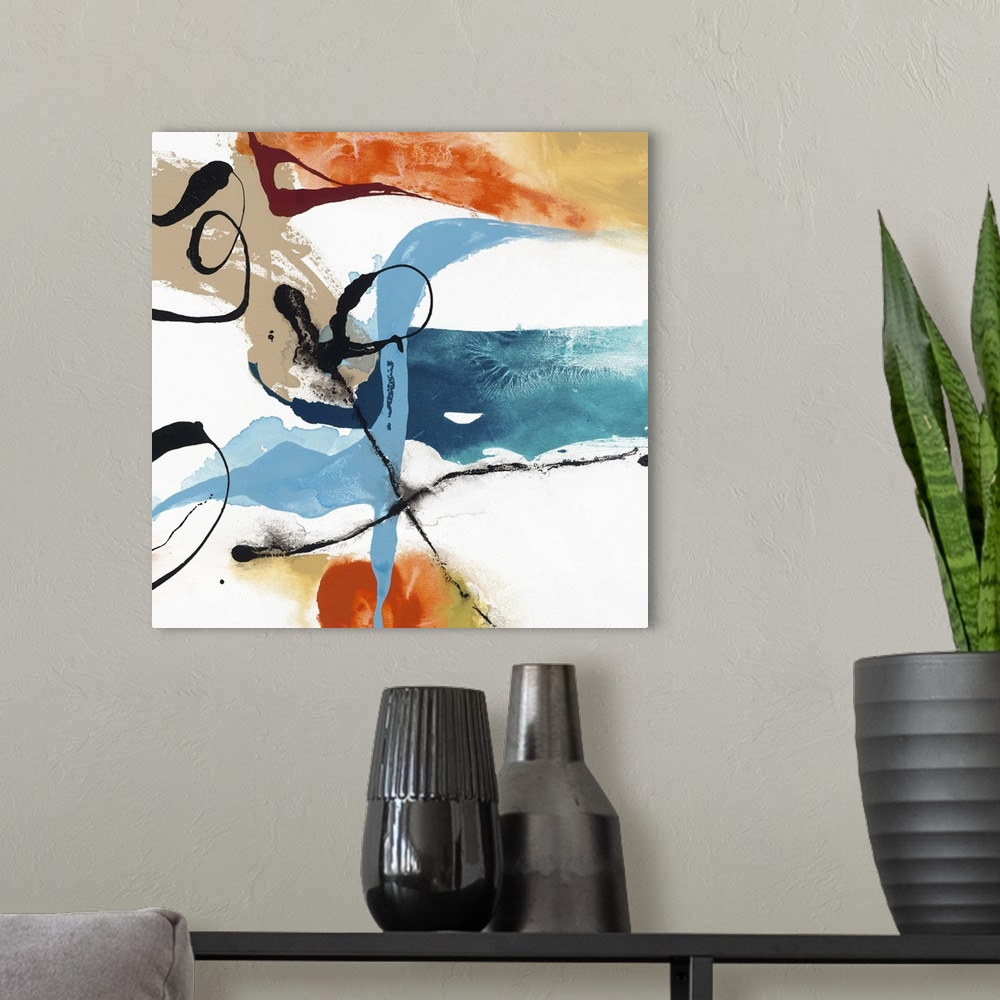 A modern room featuring Contemporary abstract artwork in wild swirls and splatters in black, orange, blue, and tan.