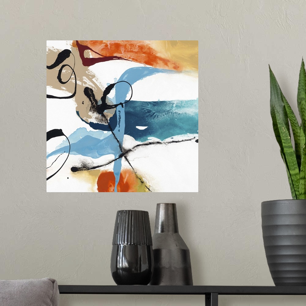 A modern room featuring Contemporary abstract artwork in wild swirls and splatters in black, orange, blue, and tan.