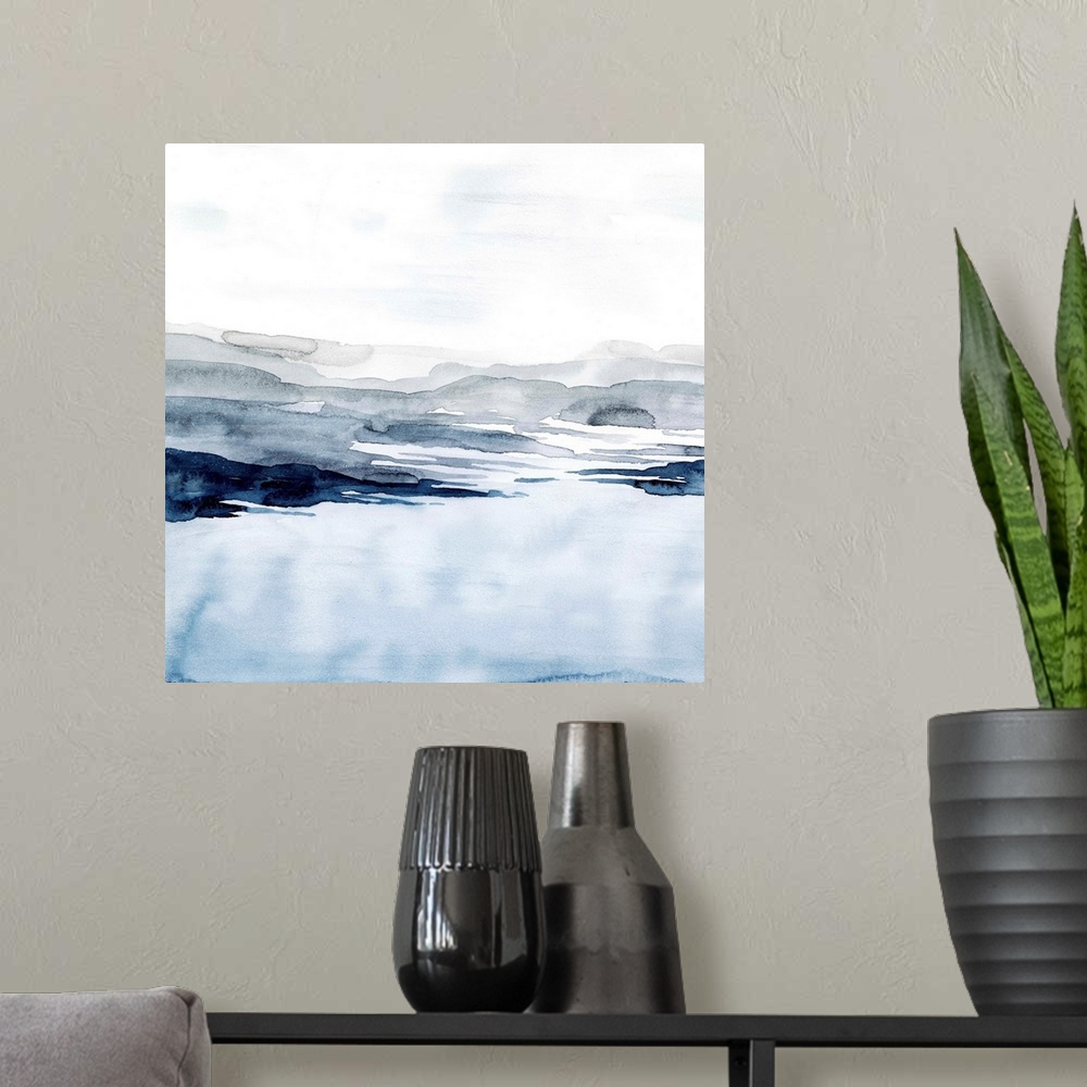 A modern room featuring Watercolor landscape art of a pale blue ocean under a light grey sky.