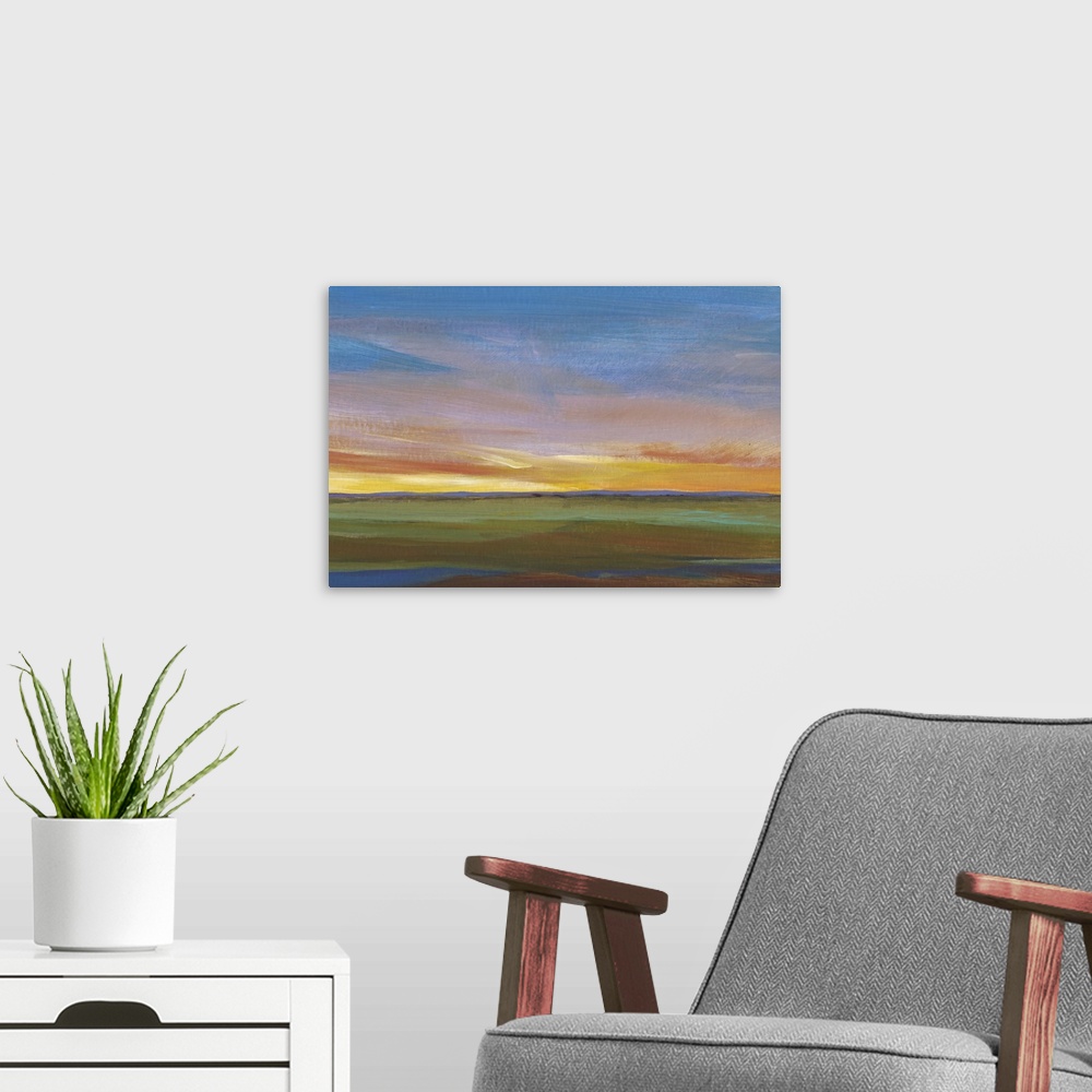 A modern room featuring Contemporary painting of a landscape at sunset, with colorful clouds.