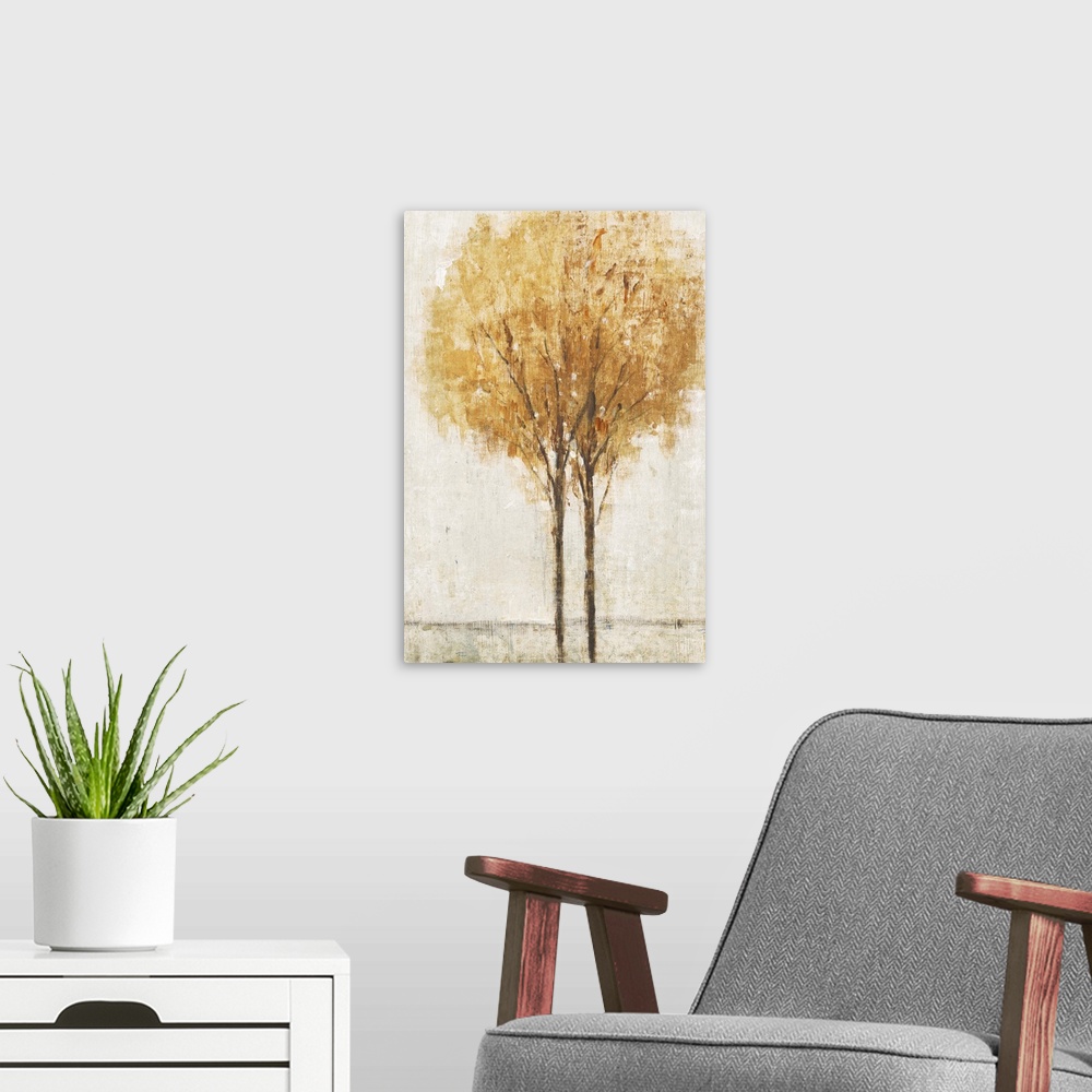 A modern room featuring Contemporary artwork of two trees in a field in autumn.