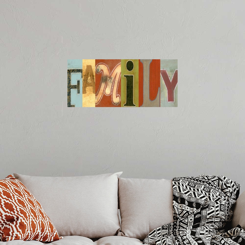 A bohemian room featuring Giant, horizontal wall hanging of the word "Family", each letter in a different font and on a dif...