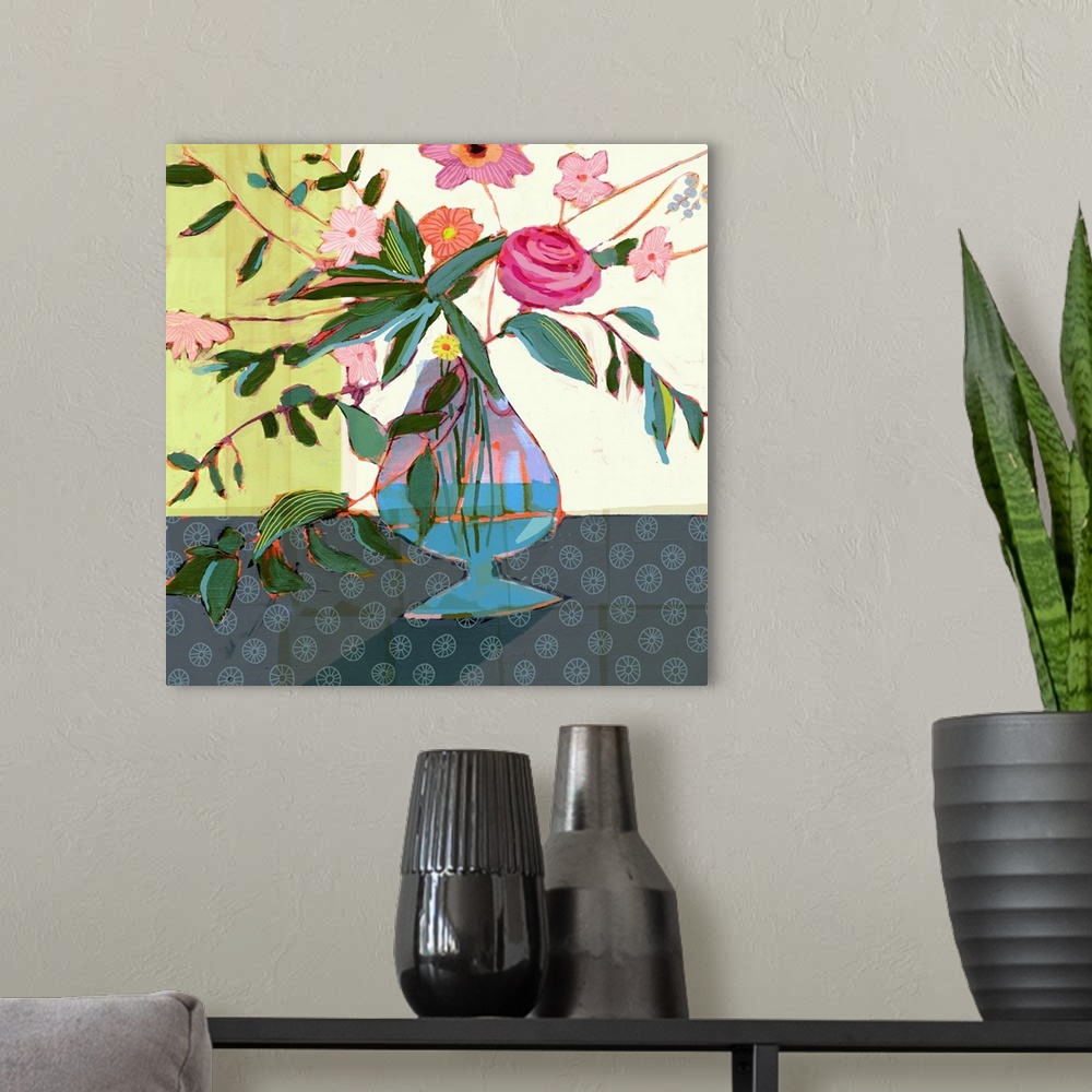 A modern room featuring This whimsical artwork features dazzling flowers arranged energetically in a blue vase over a pat...