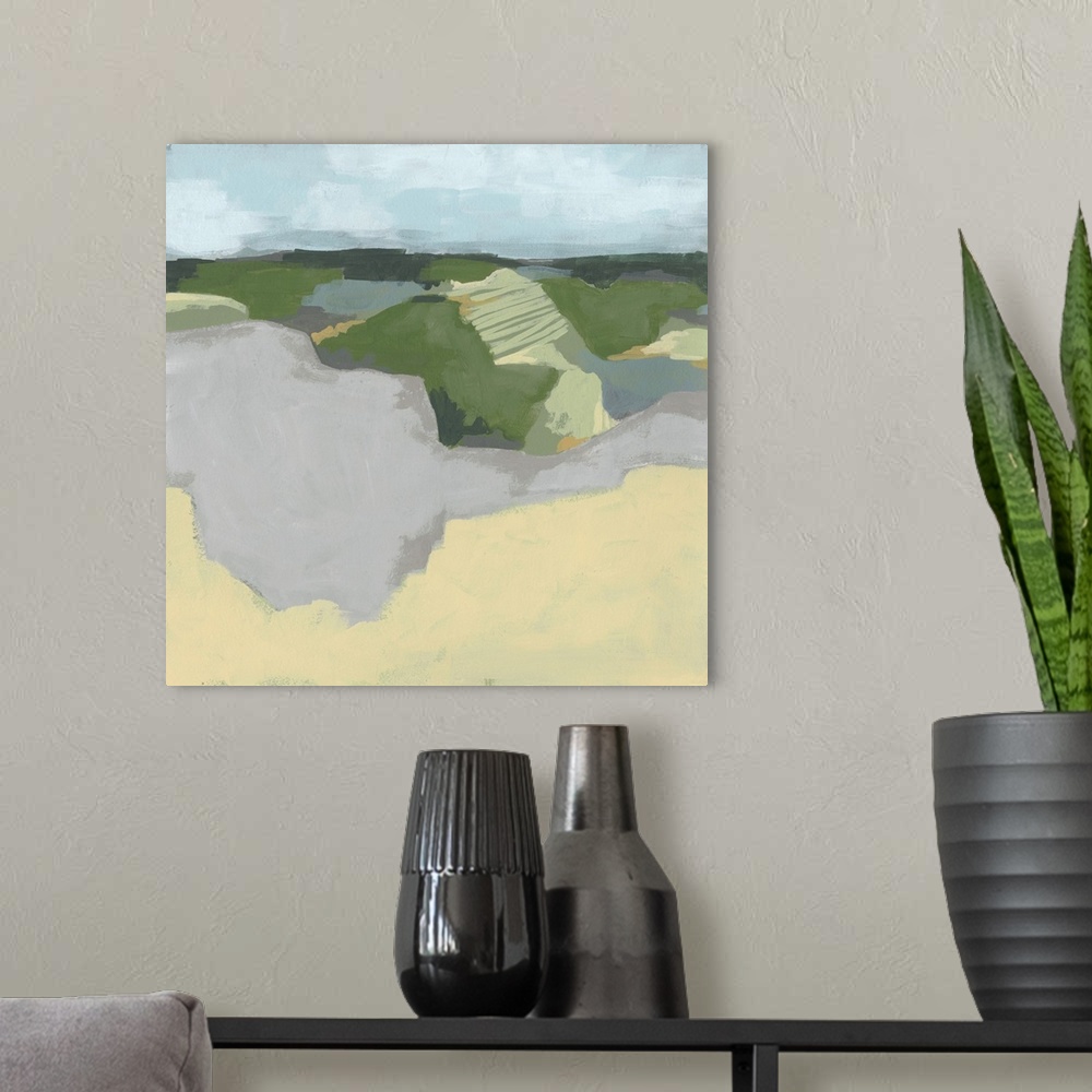 A modern room featuring Contemporary abstract landscape in green, brown, and gray with a light blue sky overhead.