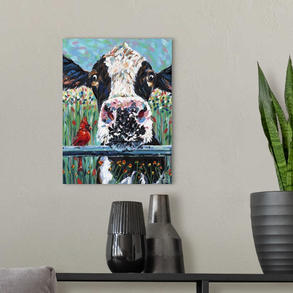 A modern room featuring Contemporary painting of a black and white cow resting its head on a blue fence.