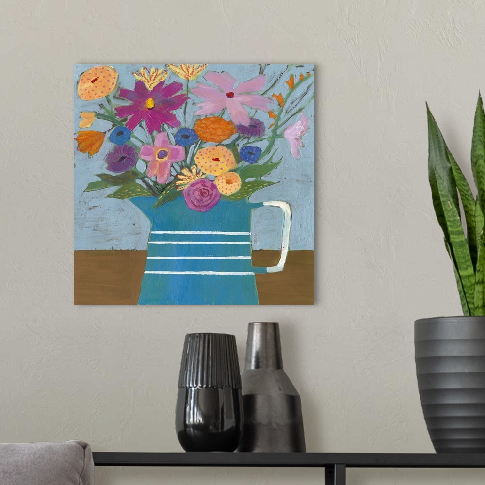 A modern room featuring Folk art painting of bouquet of flowers in a farmhouse pitcher.