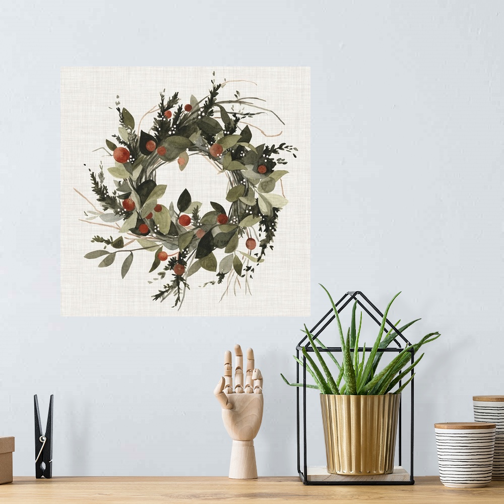 A bohemian room featuring A decorative farmhouse wreath of holiday greenery and berries on a linen background.