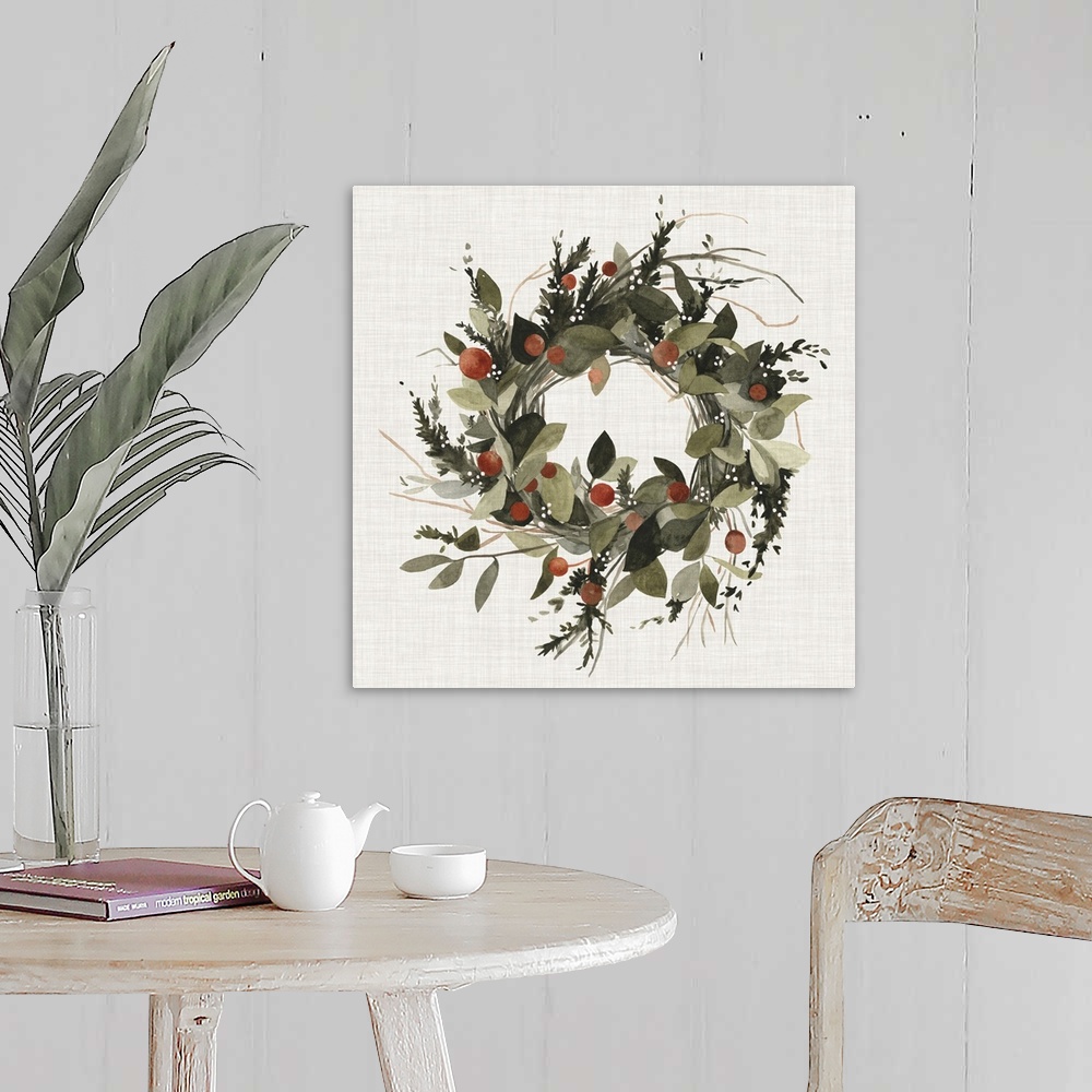 A farmhouse room featuring A decorative farmhouse wreath of holiday greenery and berries on a linen background.
