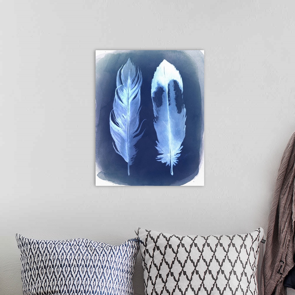 A bohemian room featuring Watercolor painting of two feathers, with the appearance of a film negative.