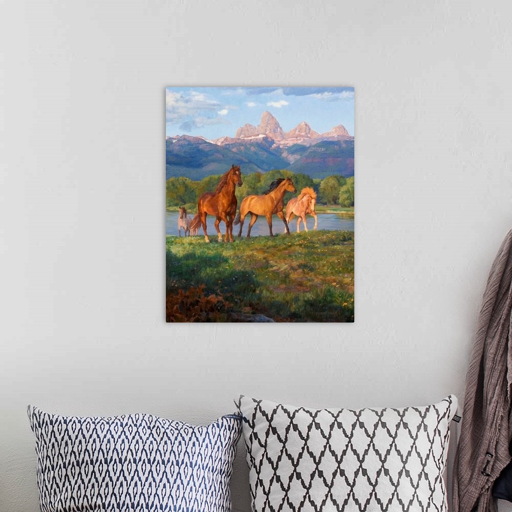 A bohemian room featuring Contemporary colorful painting of a herd of horses running through a meadow, with a mountain rang...