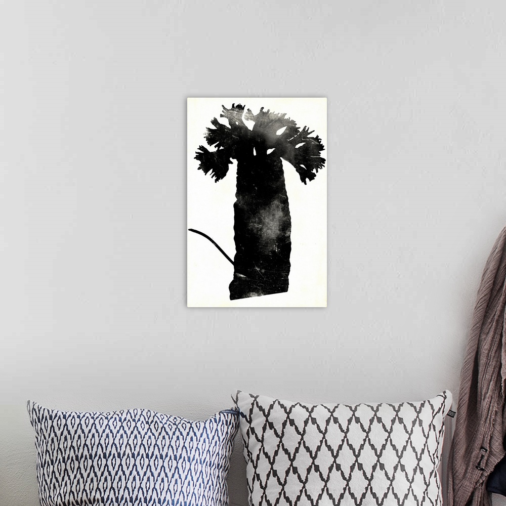 A bohemian room featuring This contemporary artwork features a silhouette of a fern leaf over a neutral background with dis...
