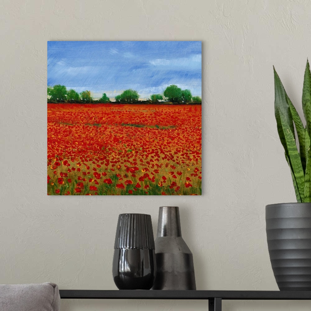 A modern room featuring Contemporary painting of a field of red poppies under a blue sky.