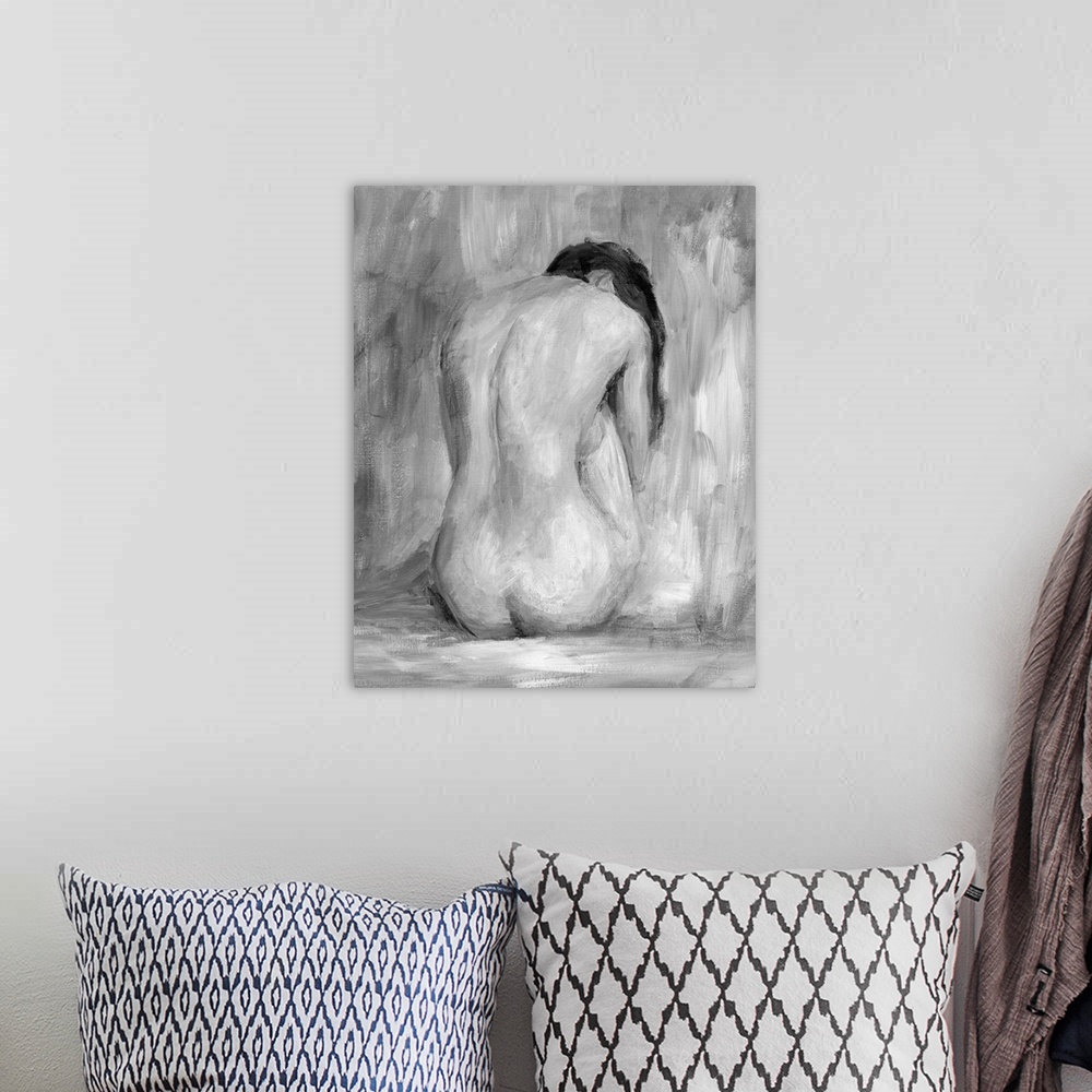 A bohemian room featuring Portrait, large figurative painting of the back of a nude woman sitting on the floor, her head ha...