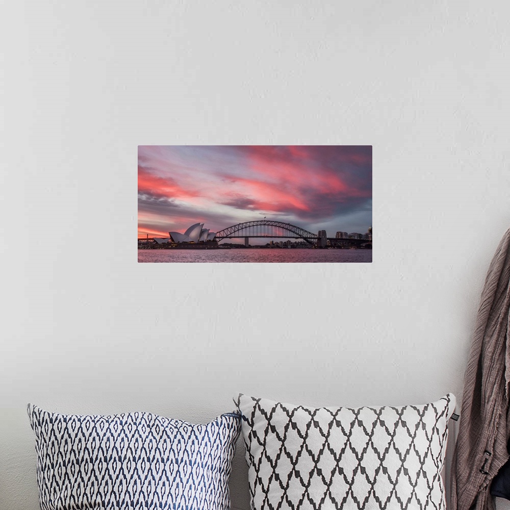 A bohemian room featuring Panoramic photograph of the Harbor Bridge in Sydney, Australia at sunset.