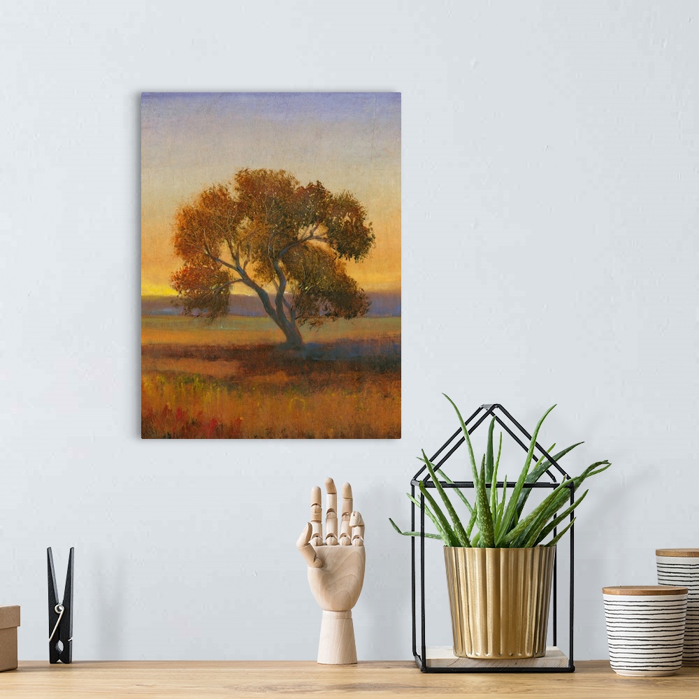 A bohemian room featuring Contemporary landscape painting of a lone tree in a meadow at sunset.
