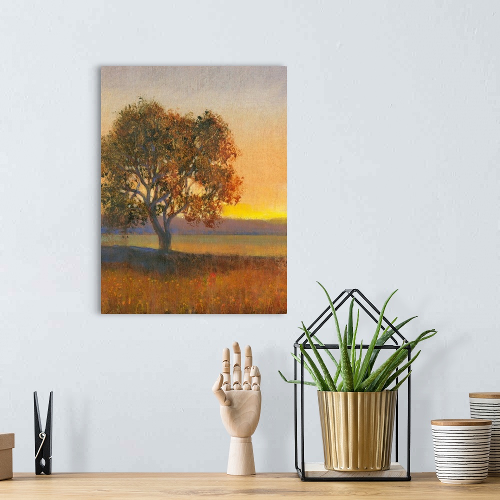 A bohemian room featuring Contemporary landscape painting of a lone tree in a meadow at sunset.