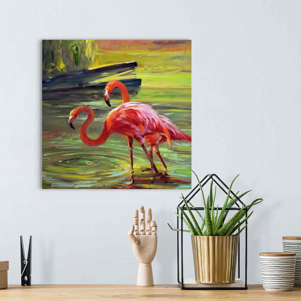 A bohemian room featuring Painting of a flock of flamingos wading through water.