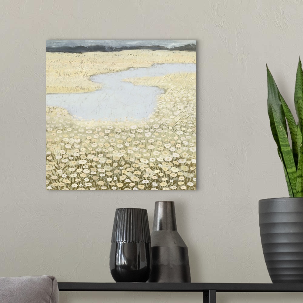 A modern room featuring Square contemporary painting of a field of flower surround a lake, all in muted tones.