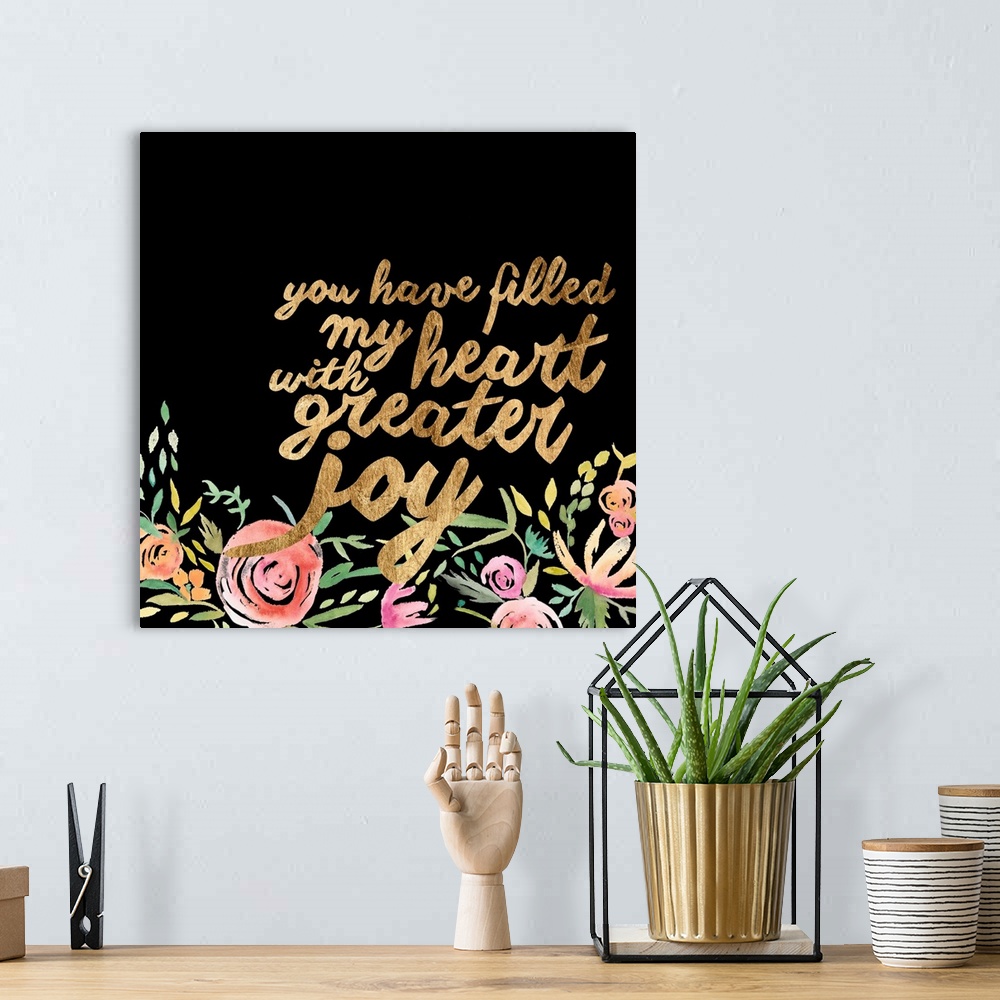 A bohemian room featuring This decorative artwork features the words: You have filled my heart with greater joy, in gold co...
