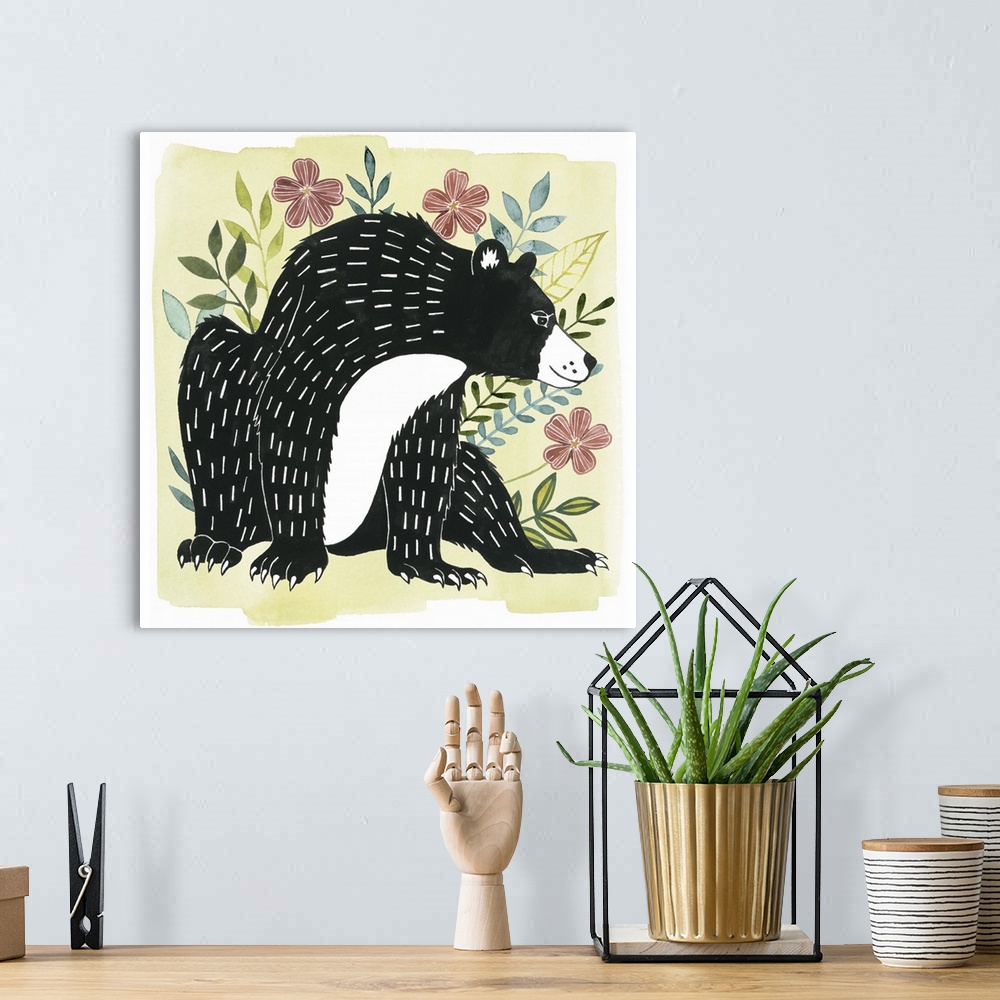 A bohemian room featuring A square decorative design of a black and white bear surrounded by flowers on a pale yellow backg...