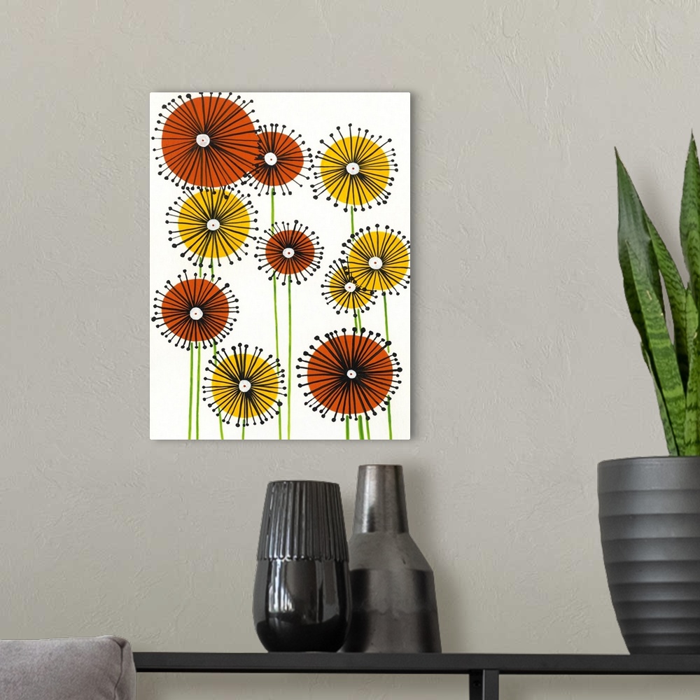 A modern room featuring Vertical painting of circular yellow and orange flowers on a white background.