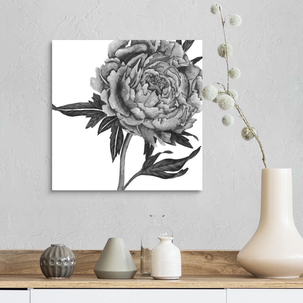 A farmhouse room featuring Black and white painting of a large rose bloom on a white background.