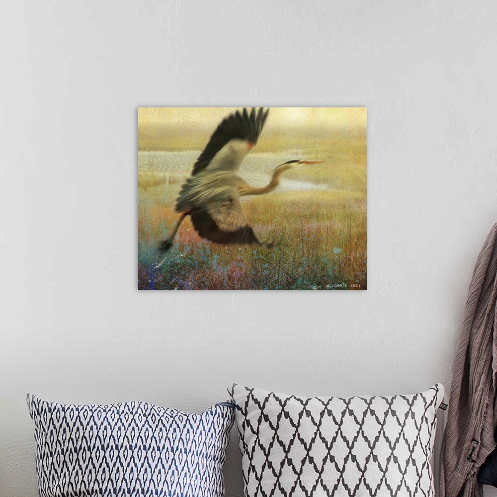 A bohemian room featuring A painting of a heron taking off into the air from a tall grass marshland.