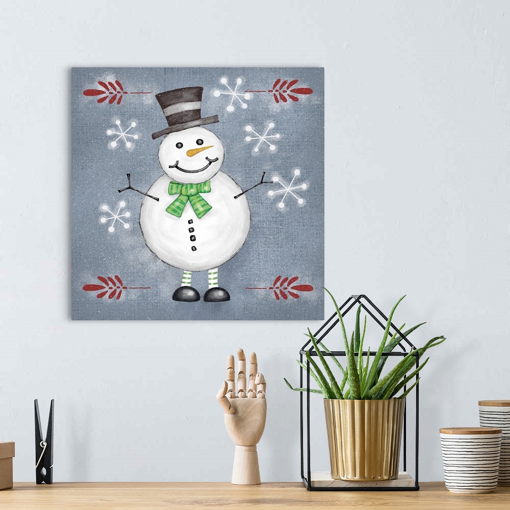 A bohemian room featuring Decorative artwork featuring a round snowman and snowflakes with paint splattered throughout.