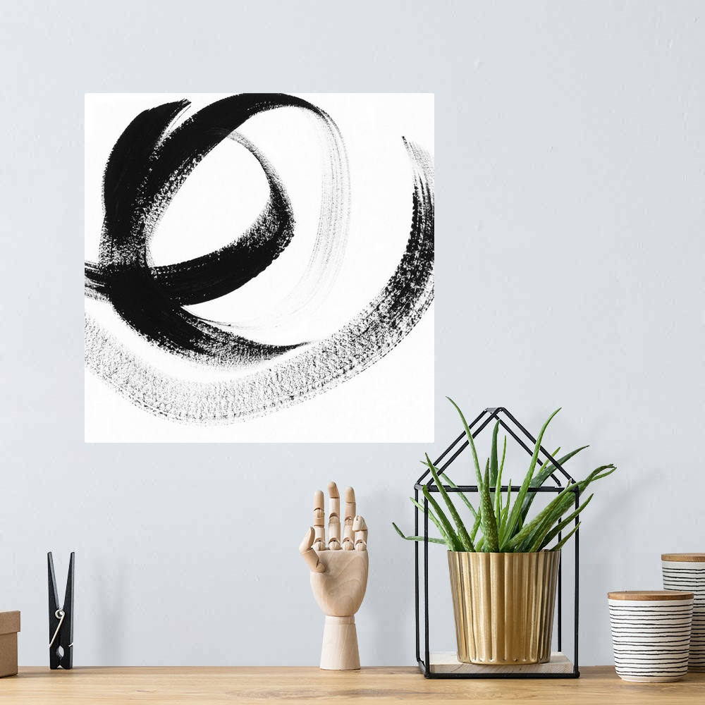 A bohemian room featuring Square abstract of bold curved brush strokes in black on a white background.