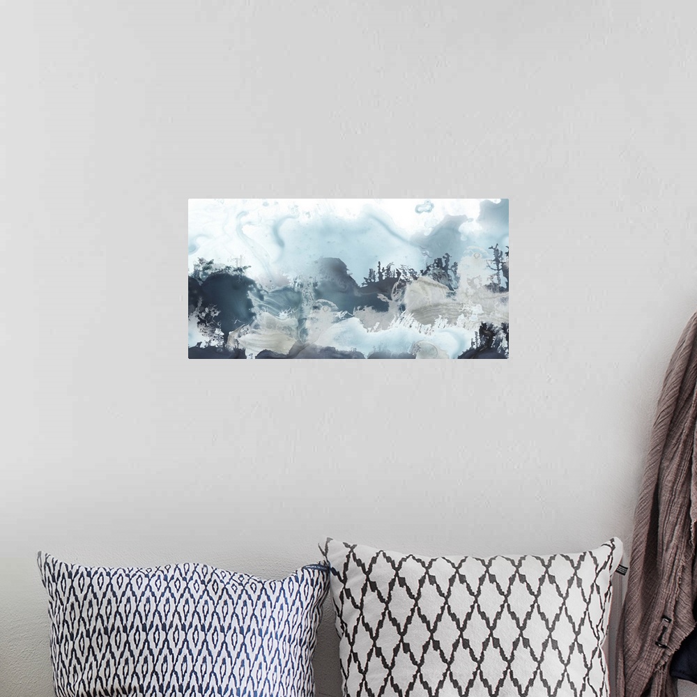 A bohemian room featuring Horizontal abstract painting of blended blue tones of watercolor.