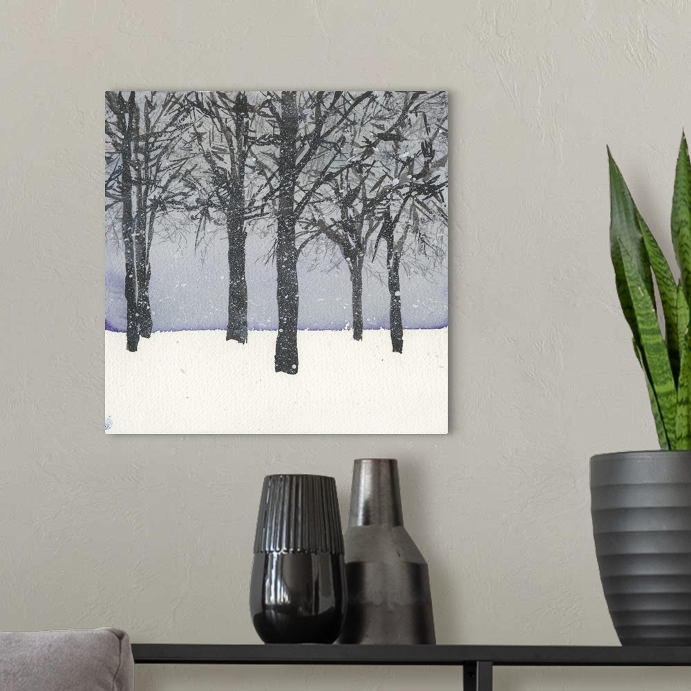 A modern room featuring A grove of trees in the snow with a pale blue sky.