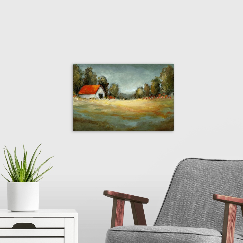 A modern room featuring Horizontal painting on a giant canvas of a golden field where a small house sits amongst a line o...