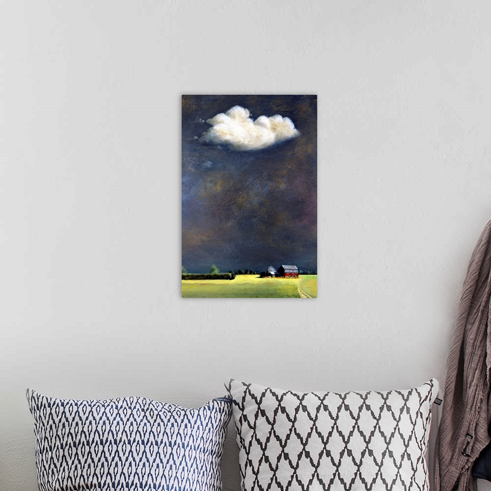 A bohemian room featuring Painting of a farm surround by a field with a large open sky and a single white cloud.